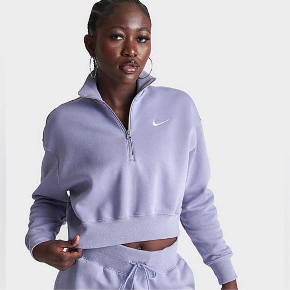 Nike Women's phoenix fleece half zip sweatshirt.